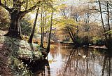 Peder Mork Monsted Famous Paintings - A River Landscape in Springtime